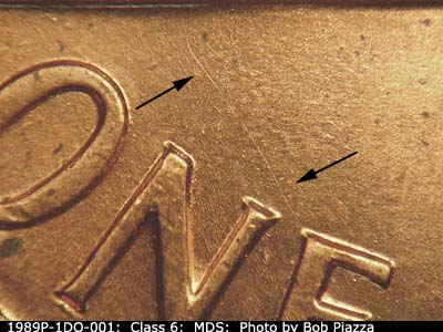 Die-stage B marker on 1989P•1DO•001 (1989 Doubled Die Obverse).