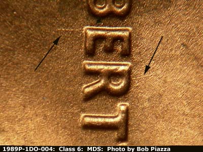 Die-stage B marker on 1989P•1DO•004 (1989 Doubled Die Obverse).