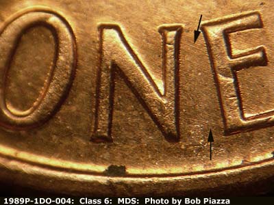Die-stage B marker on 1989P•1DO•004 (1989 Doubled Die Obverse).