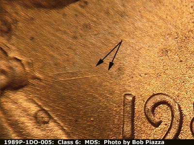 Die-stage B marker on 1989P•1DO•005 (1989 Doubled Die Obverse).