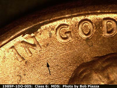 Die-stage B marker on 1989P•1DO•005 (1989 Doubled Die Obverse).