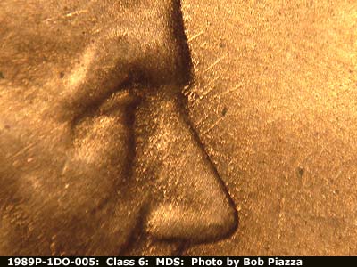 Die-stage B marker on 1989P•1DO•005 (1989 Doubled Die Obverse).