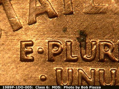 Die-stage B marker on 1989P•1DO•005 (1989 Doubled Die Obverse).