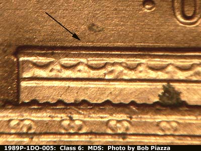 Die-stage B marker on 1989P•1DO•005 (1989 Doubled Die Obverse).
