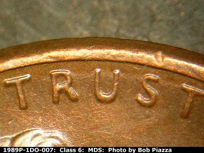 Die-stage B marker on 1989P•1DO•007 (1989 Doubled Die Obverse).