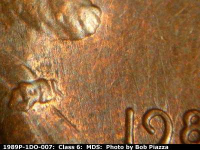 Die-stage B marker on 1989P•1DO•007 (1989 Doubled Die Obverse).