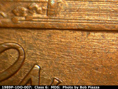 Die-stage B marker on 1989P•1DO•007 (1989 Doubled Die Obverse).