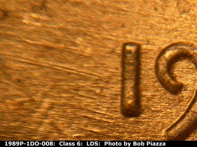 Die-stage C marker on 1989P•1DO•008 (1989 Doubled Die Obverse).