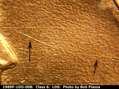 Die-stage C marker on 1989P•1DO•008 (1989 Doubled Die Obverse).