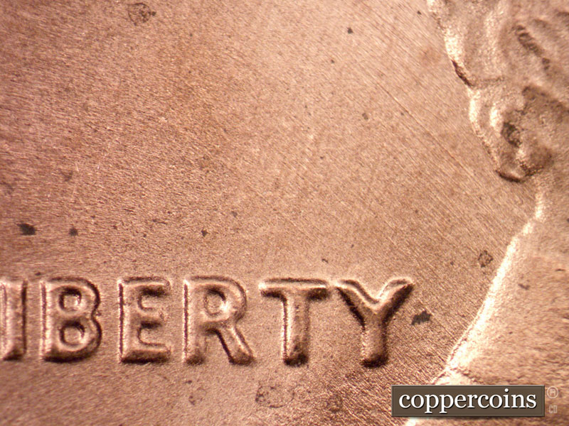 Die-stage C marker on 1989P•1DO•010 (1989 Doubled Die Obverse).