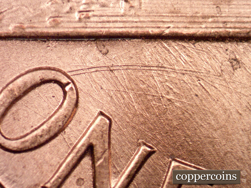 Die-stage C marker on 1989P•1DO•010 (1989 Doubled Die Obverse).