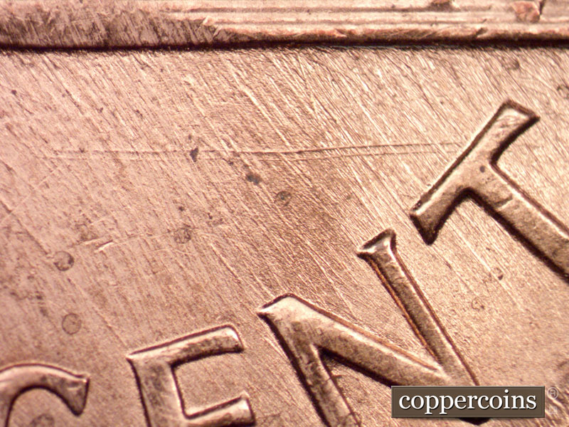 Die-stage C marker on 1989P•1DO•010 (1989 Doubled Die Obverse).