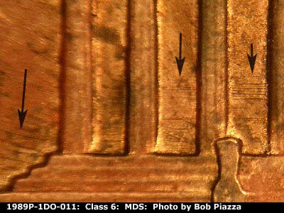 Die-stage B marker on 1989P•1DO•011 (1989 Doubled Die Obverse).