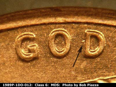 Die-stage B marker on 1989P•1DO•012 (1989 Doubled Die Obverse).