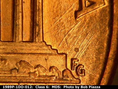 Die-stage B marker on 1989P•1DO•012 (1989 Doubled Die Obverse).