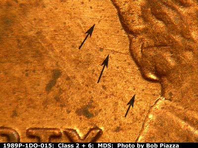 Die-stage B marker on 1989P•1DO•015 (1989 Doubled Die Obverse).