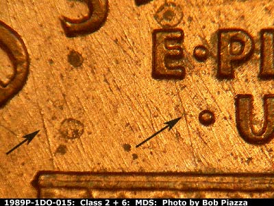 Die-stage B marker on 1989P•1DO•015 (1989 Doubled Die Obverse).