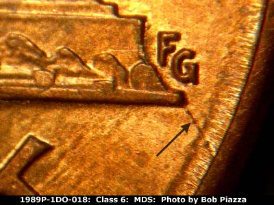 Die-stage B marker on 1989P•1DO•018 (1989 Doubled Die Obverse).