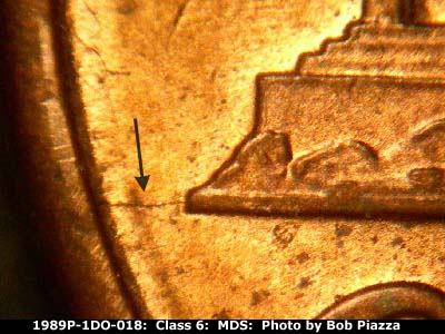 Die-stage B marker on 1989P•1DO•018 (1989 Doubled Die Obverse).