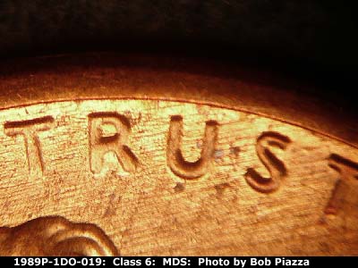 Die-stage B marker on 1989P•1DO•019 (1989 Doubled Die Obverse).