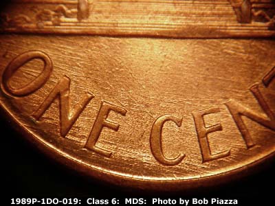 Die-stage B marker on 1989P•1DO•019 (1989 Doubled Die Obverse).