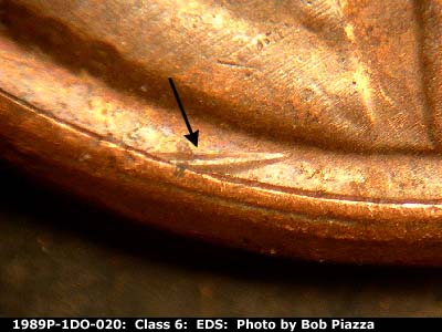 Die-stage A marker on 1989P•1DO•020 (1989 Doubled Die Obverse).