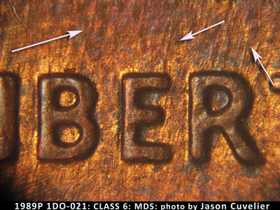 Die-stage B marker on 1989P•1DO•021 (1989 Doubled Die Obverse).