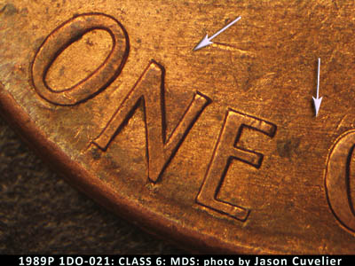 Die-stage B marker on 1989P•1DO•021 (1989 Doubled Die Obverse).