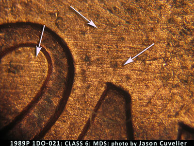 Die-stage B marker on 1989P•1DO•021 (1989 Doubled Die Obverse).