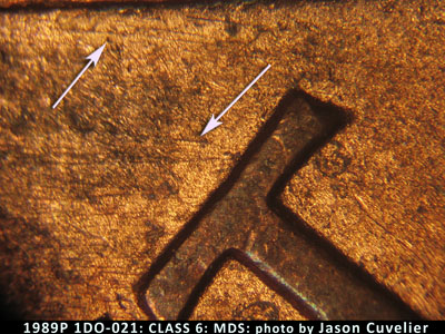 Die-stage B marker on 1989P•1DO•021 (1989 Doubled Die Obverse).