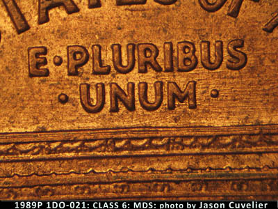 Die-stage B marker on 1989P•1DO•021 (1989 Doubled Die Obverse).