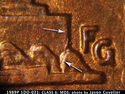 Die-stage B marker on 1989P•1DO•021 (1989 Doubled Die Obverse).