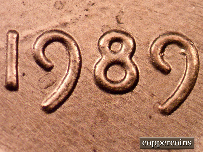 Die-stage A marker on 1989P•1DO•023 (1989 Doubled Die Obverse).