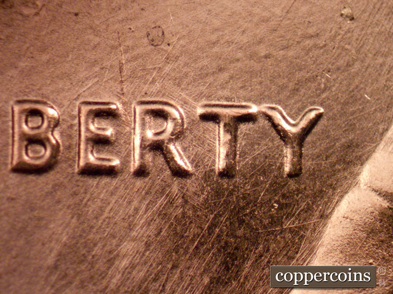 Die-stage A marker on 1989P•1DO•023 (1989 Doubled Die Obverse).