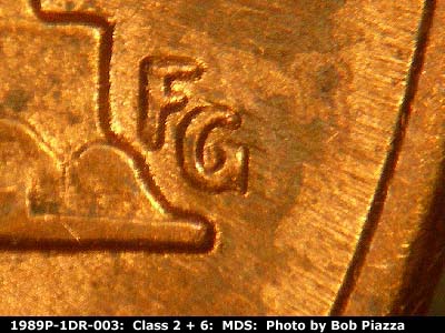 Die-stage B marker on 1989P•1DR•003 (1989 Doubled Die Reverse).