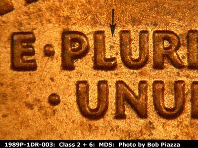 Die-stage B marker on 1989P•1DR•003 (1989 Doubled Die Reverse).