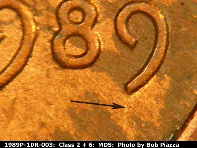 Die-stage B marker on 1989P•1DR•003 (1989 Doubled Die Reverse).