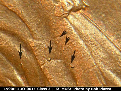 Die-stage B marker on 1990P•1DO•001 (1990 Doubled Die Obverse).