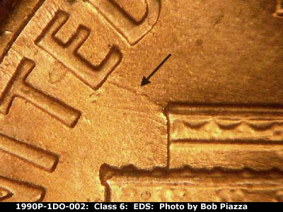 Die-stage A marker on 1990P•1DO•002 (1990 Doubled Die Obverse).