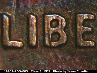 Die-stage A marker on 1990P•1DO•003 (1990 Doubled Die Obverse).
