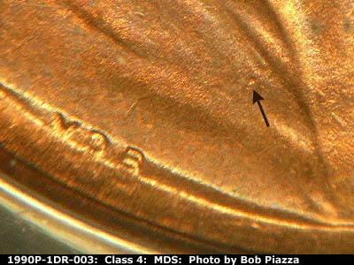 Die-stage B marker on 1990P•1DR•003 (1990 Doubled Die Reverse).