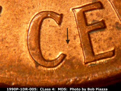 Die-stage B marker on 1990P•1DR•005 (1990 Doubled Die Reverse).