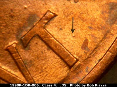 Die-stage C marker on 1990P•1DR•006 (1990 Doubled Die Reverse).