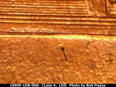 Die-stage C marker on 1990P•1DR•006 (1990 Doubled Die Reverse).