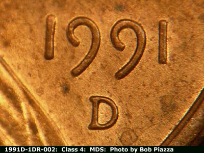 Die-stage B marker on 1991D•1DR•002 (1991 Doubled Die Reverse).