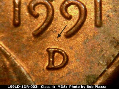 Die-stage B marker on 1991D•1DR•003 (1991 Doubled Die Reverse).