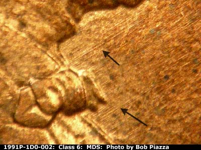 Die-stage B marker on 1991P•1DO•002 (1991 Doubled Die Obverse).