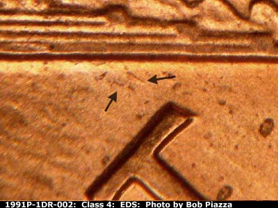 Die-stage A marker on 1991P•1DR•002 (1991 Doubled Die Reverse).