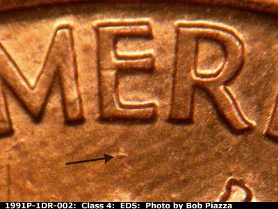 Die-stage A marker on 1991P•1DR•002 (1991 Doubled Die Reverse).