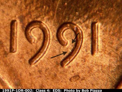 Die-stage A marker on 1991P•1DR•002 (1991 Doubled Die Reverse).